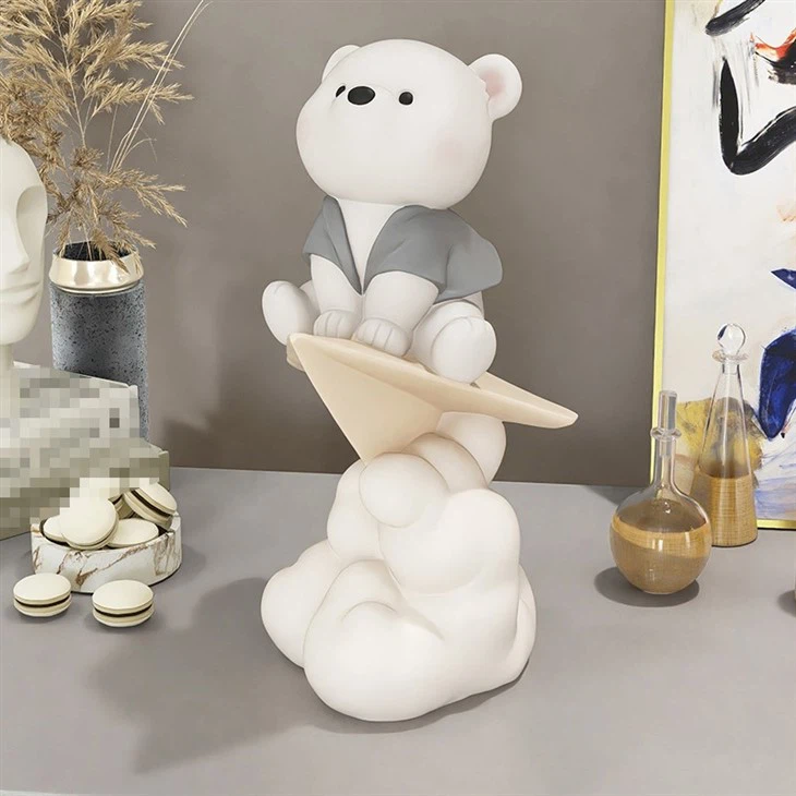 Paper Plane And Bear Statue